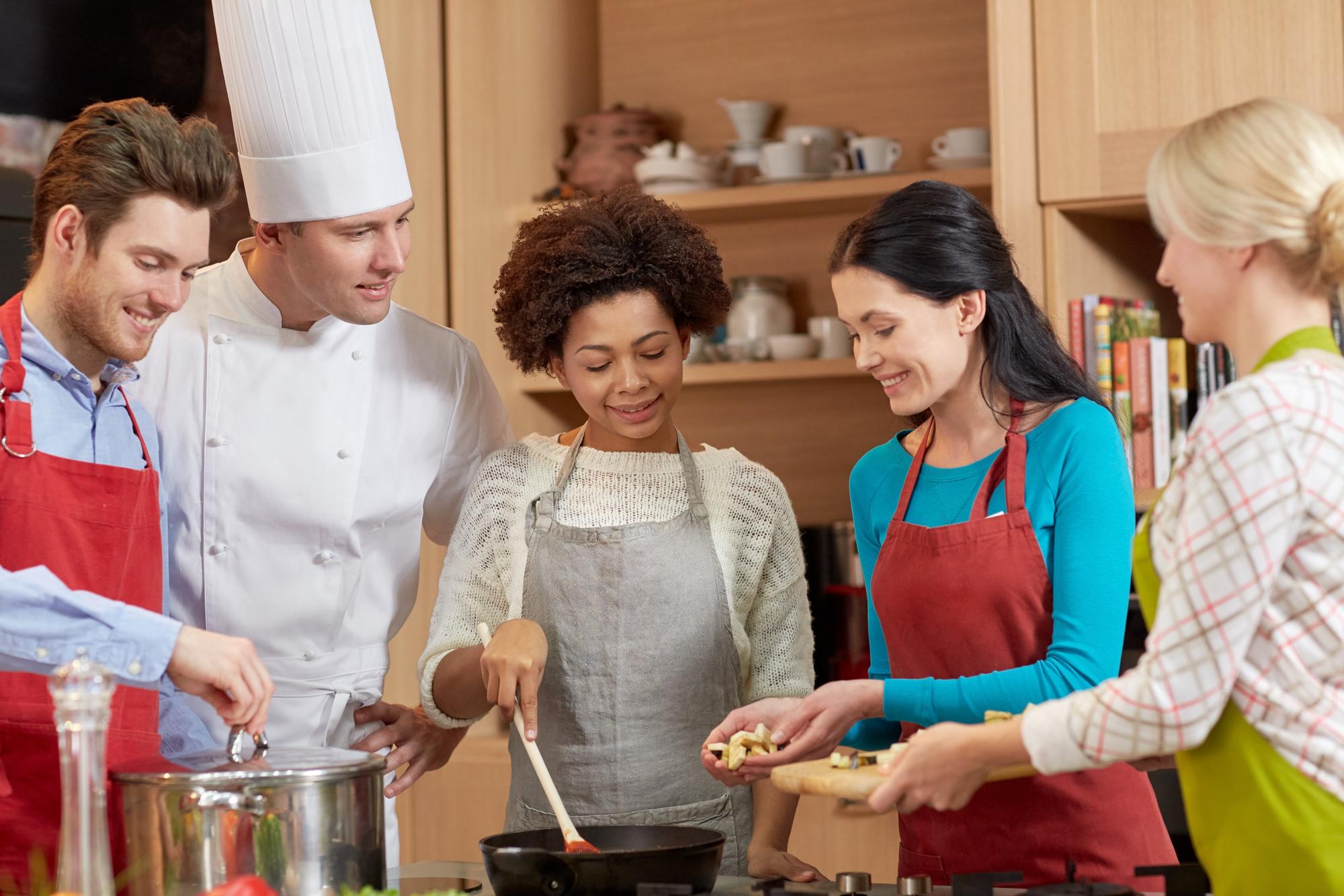 Cook teaching a small group